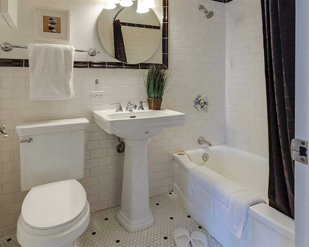 small bathroom with white tiles